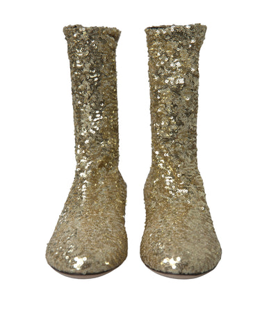 Gold sequined Dolce & Gabbana short stretch boots with pointed toes and sleek design, perfect for stylish occasions.