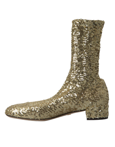 Gold sequined Dolce & Gabbana short stretch boots with a shiny, glamorous finish and sleek design.