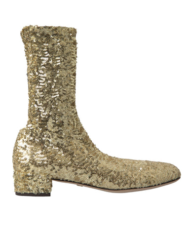 Gold sequined short boots from Dolce & Gabbana featuring stretch material and a shiny, glamorous design.