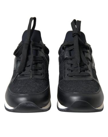 Black floral lace leather sneakers by Dolce & Gabbana with intricate lace details and sleek design.