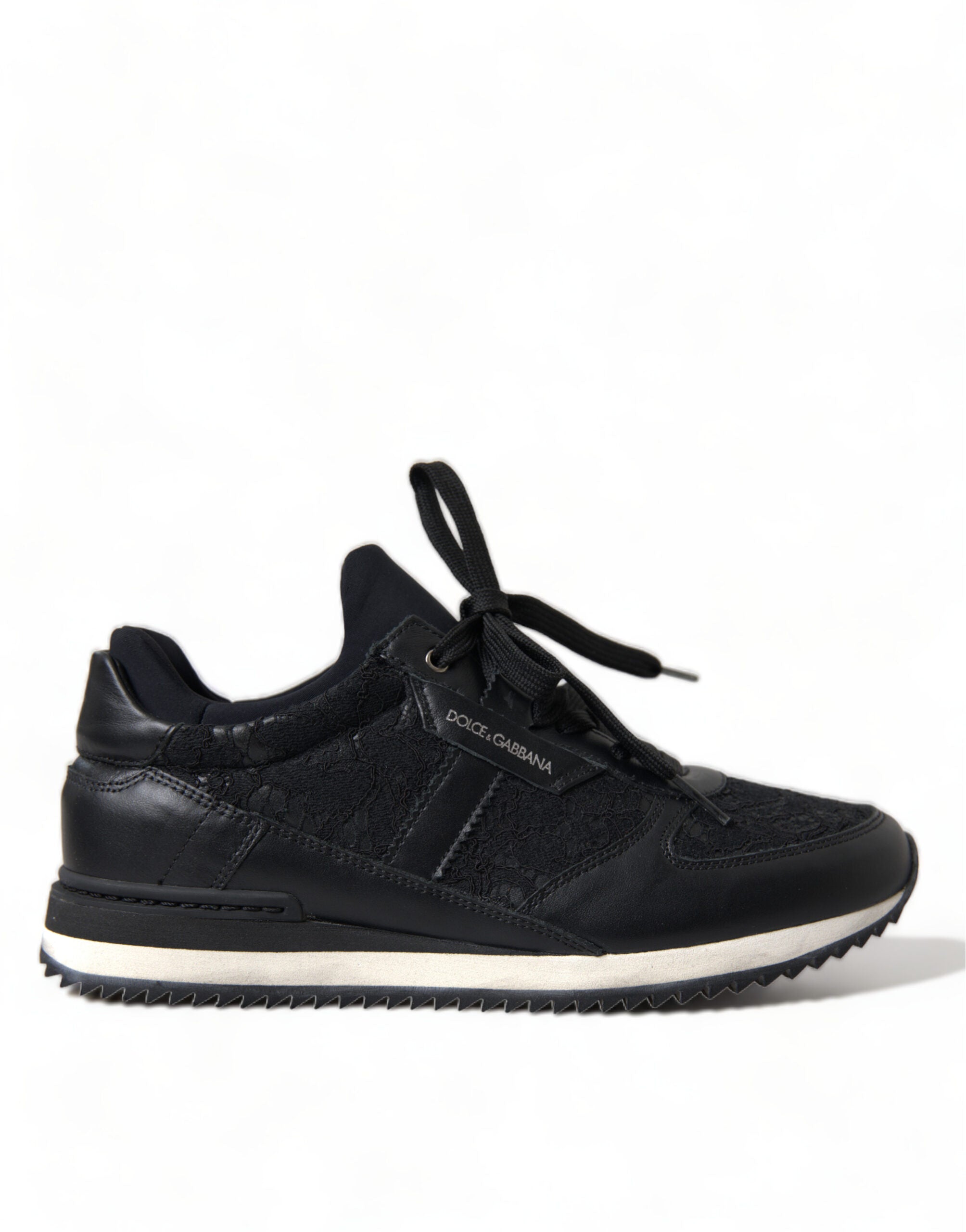 Black floral lace leather sneakers by Dolce & Gabbana with intricate lace details and stylish sneaker design.