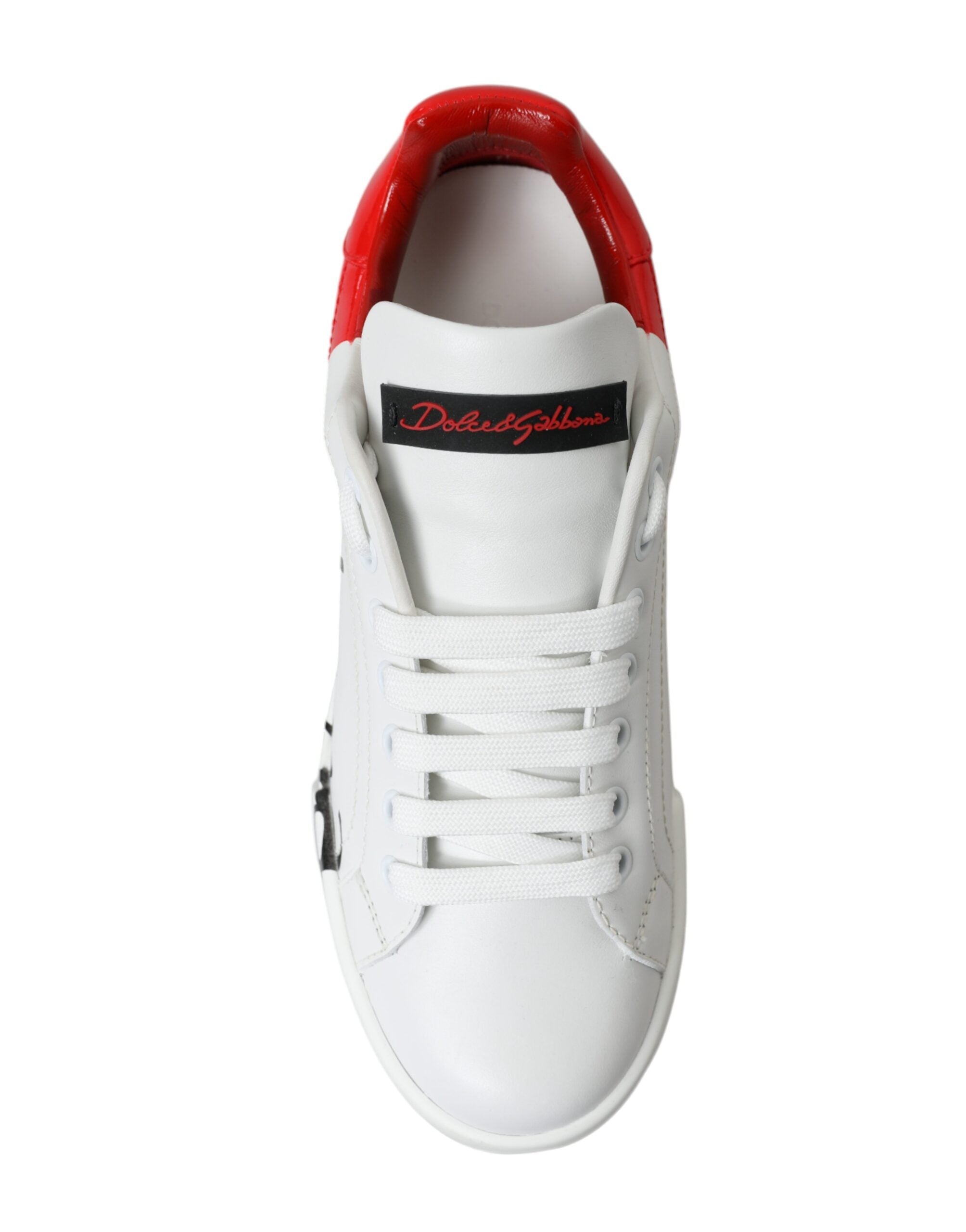 White and red lace-up women's low-top sneakers by Dolce & Gabbana, featuring stylish design and comfortable fit.