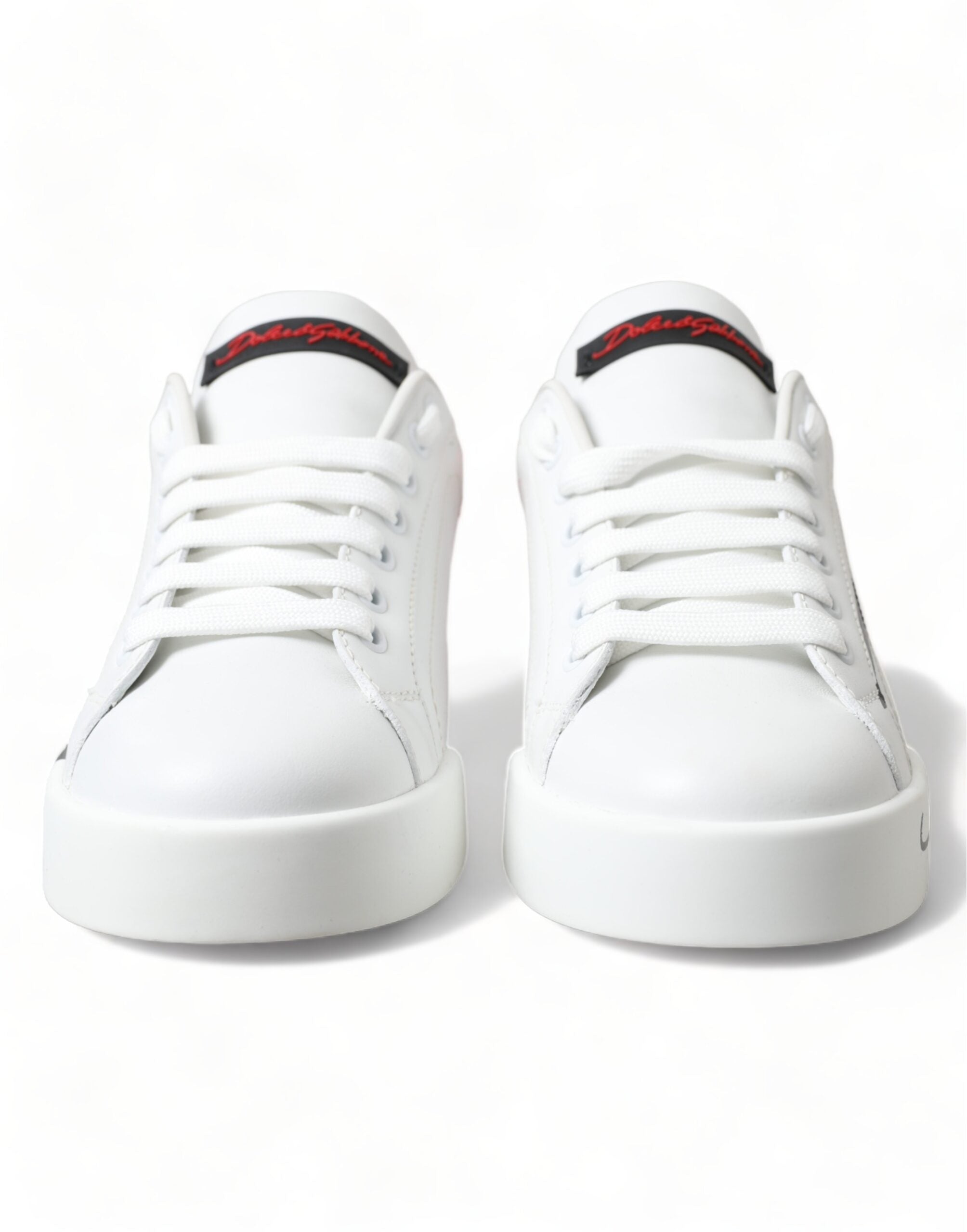 White and red lace-up women's low top sneakers by Dolce & Gabbana with stylish design and comfortable fit.