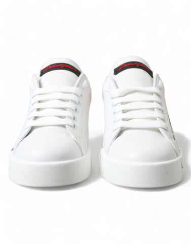 White and red lace-up women's low top sneakers by Dolce & Gabbana with stylish design and comfortable fit.