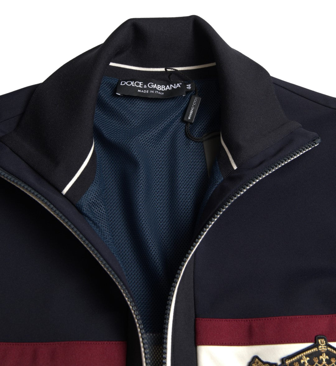 Blue heraldic full-zip cardigan sweater by Dolce & Gabbana featuring a detailed crest design and ribbed cuffs.