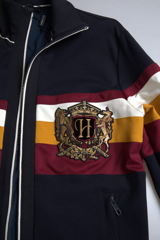 Blue heraldic full-zip cardigan sweater by Dolce & Gabbana with intricate crest embroidery and ribbed cuffs.