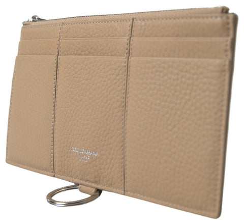 Beige leather shoulder strap for cardholder wallet by Dolce & Gabbana, showing the strap attached to a slim leather wallet.