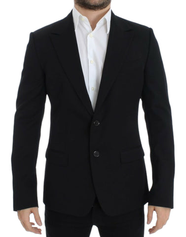 Black wool slim fit blazer by Dolce & Gabbana, tailored with a classic lapel and sleek design, displayed on a hanger.