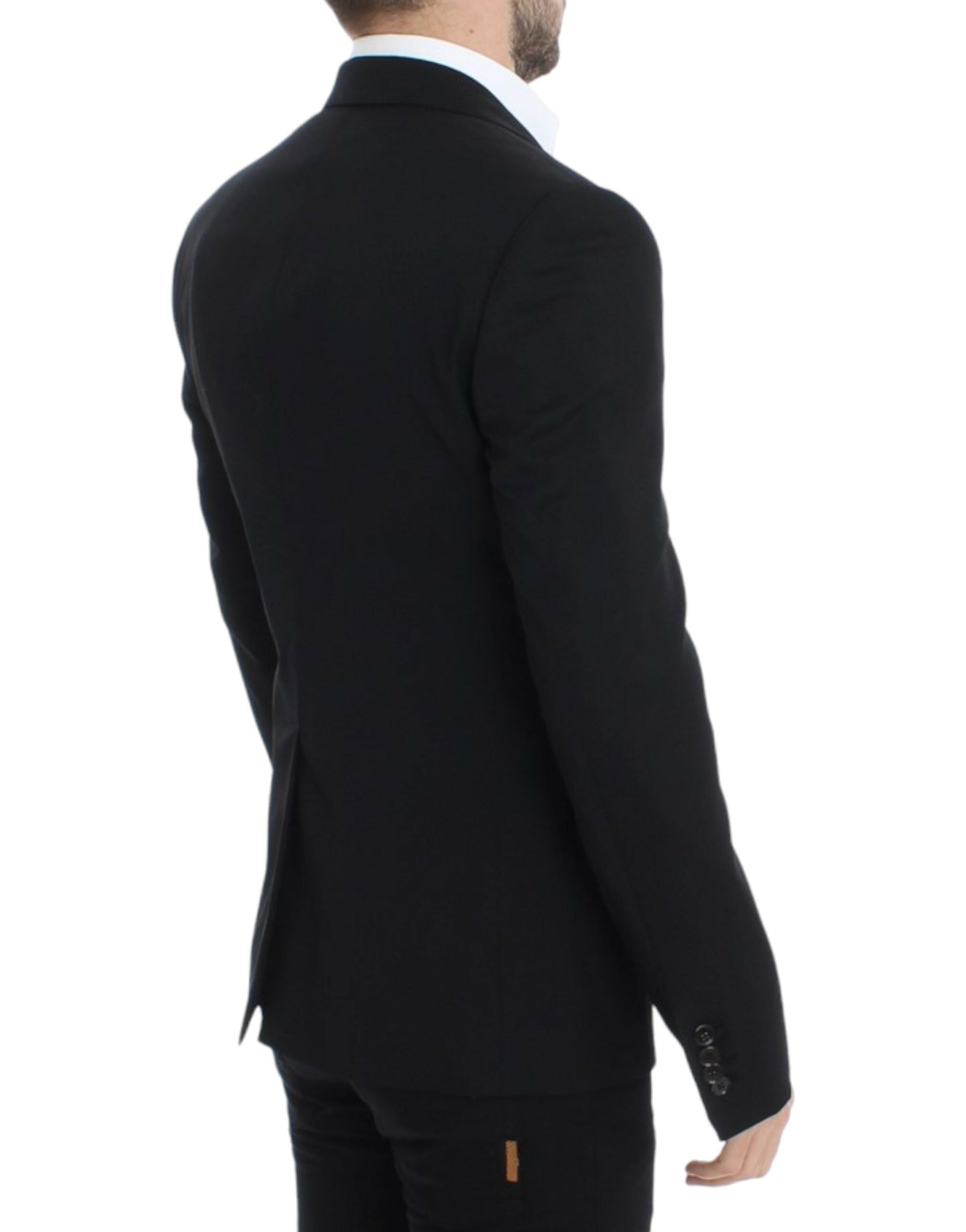 Black wool slim fit blazer by Dolce & Gabbana, tailored with a sleek design and classic lapel, shown on a mannequin.