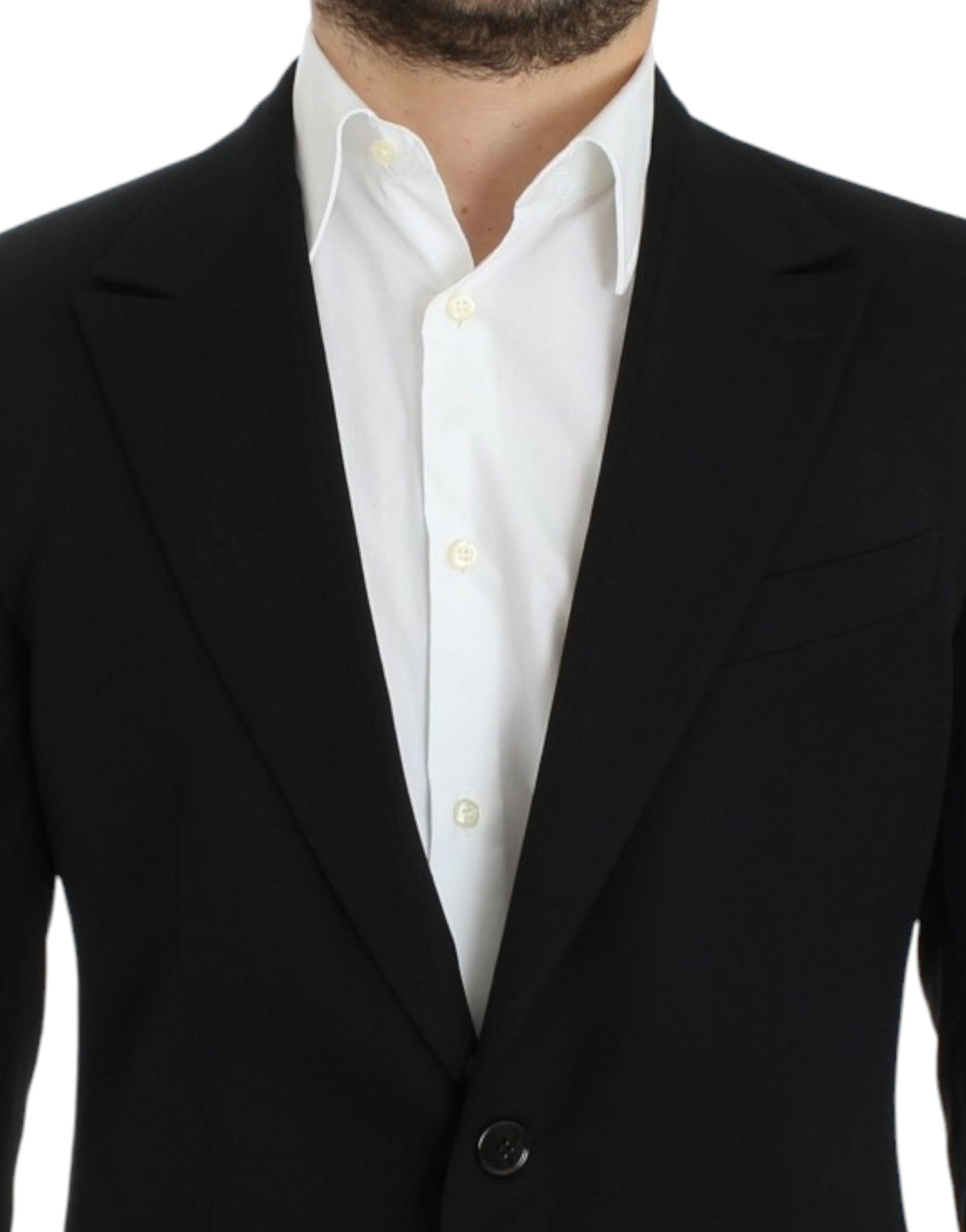 Black wool slim fit blazer by Dolce & Gabbana, tailored fit with notch lapel and button closure, styled on a hanger.