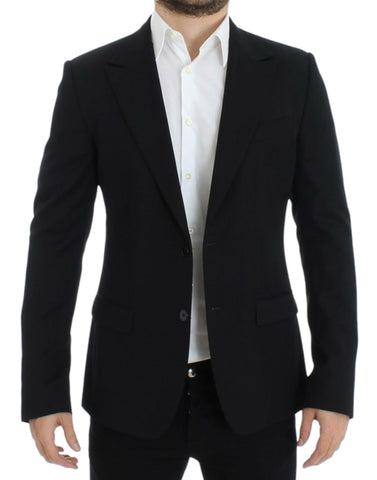Black wool slim fit blazer by Dolce & Gabbana, tailored with a sleek lapel and structured design, shown on a hanger.