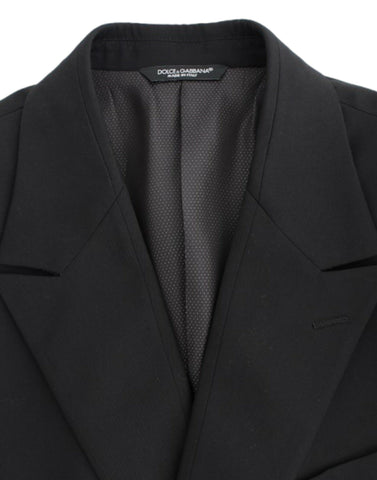 Black wool slim fit blazer by Dolce & Gabbana, tailored with a sleek design and classic lapel collar, displayed on a mannequin.