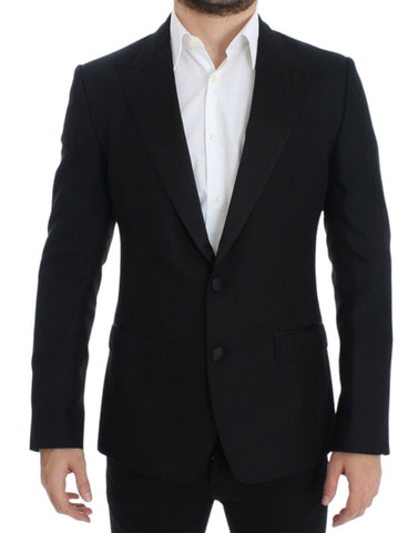 Black wool silk Sicilia blazer by Dolce & Gabbana displayed on a mannequin, showcasing tailored fit and elegant lapel details.