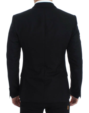 Black wool silk Sicilia blazer by Dolce & Gabbana, showing tailored fit and classic lapel details on a mannequin.