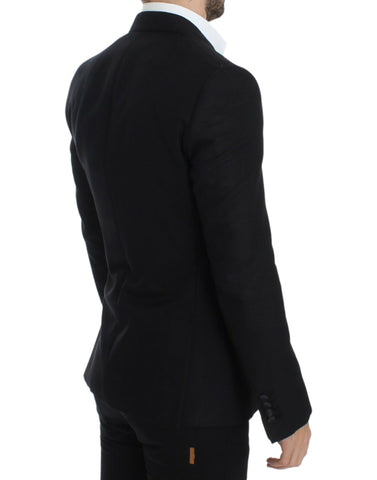 Black wool silk Sicilia blazer by Dolce & Gabbana, tailored fit with classic lapels and button closure, shown on a mannequin.