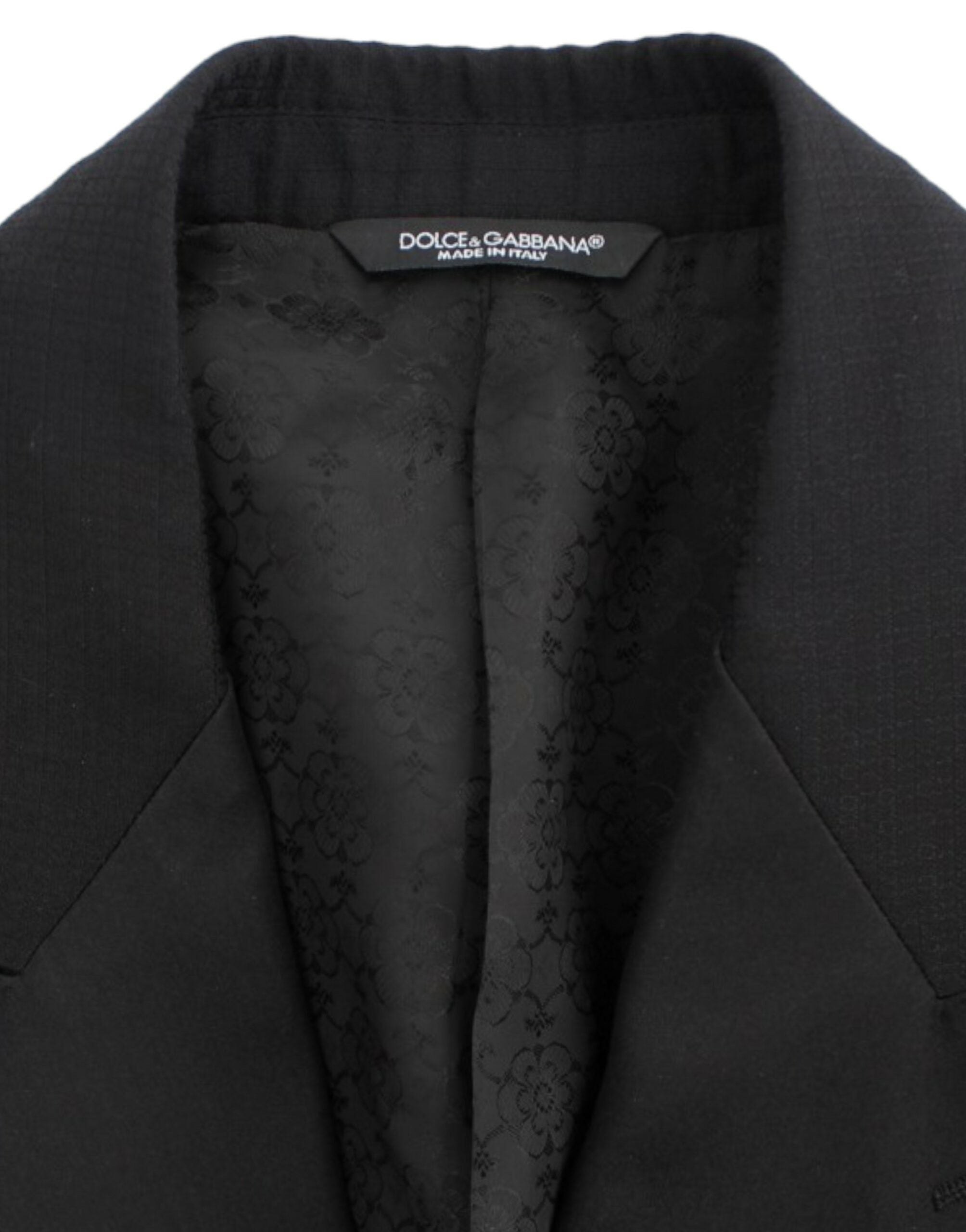Black wool silk Sicilia blazer by Dolce & Gabbana, tailored fit with lapel collar and button closure, stylish and elegant.