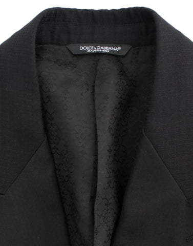 Black wool silk Sicilia blazer by Dolce & Gabbana, tailored fit with lapel collar and button closure, stylish and elegant.