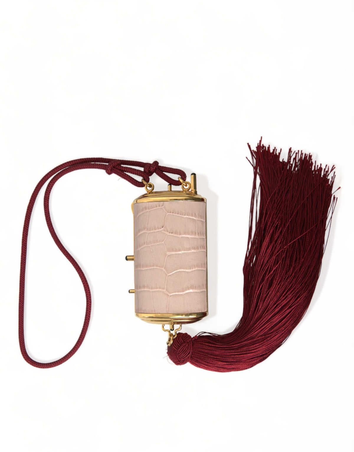 Pink exotic leather mini makeup bag with tassel and mirror from Dolce & Gabbana, showcasing a compact and stylish accessory.