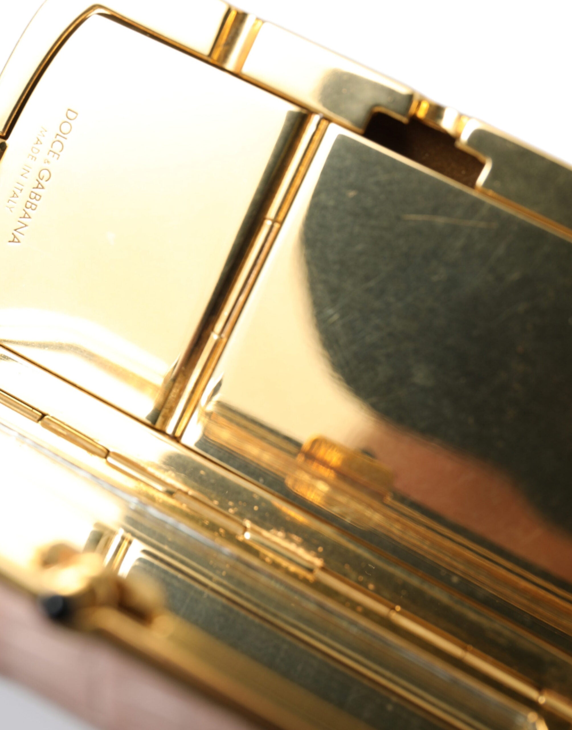Pink exotic leather mini makeup bag with tassel and mirror from Dolce & Gabbana, featuring a compact, stylish design.