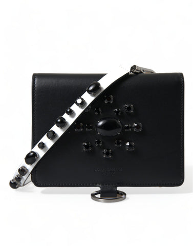Black leather card holder wallet with crystal embellishments by Dolce & Gabbana, featuring multiple card slots and a sleek design.