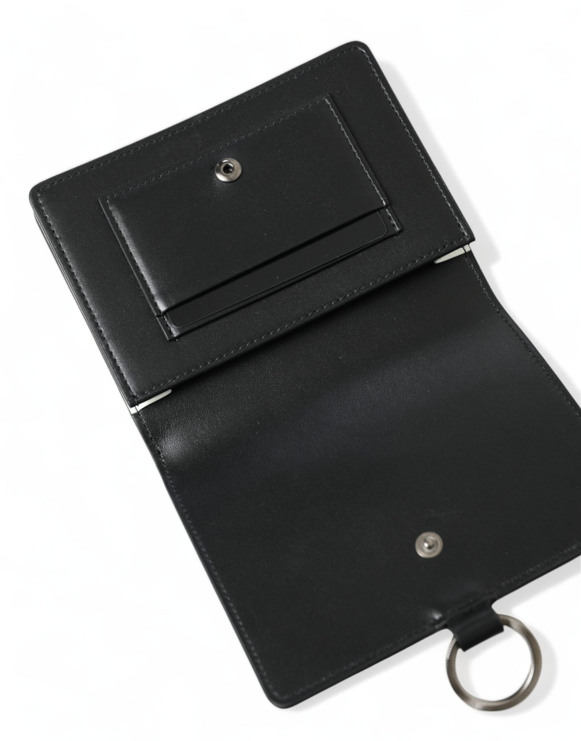 Black leather card holder wallet with crystal embellishments from Dolce & Gabbana, featuring multiple card slots and a sleek design.