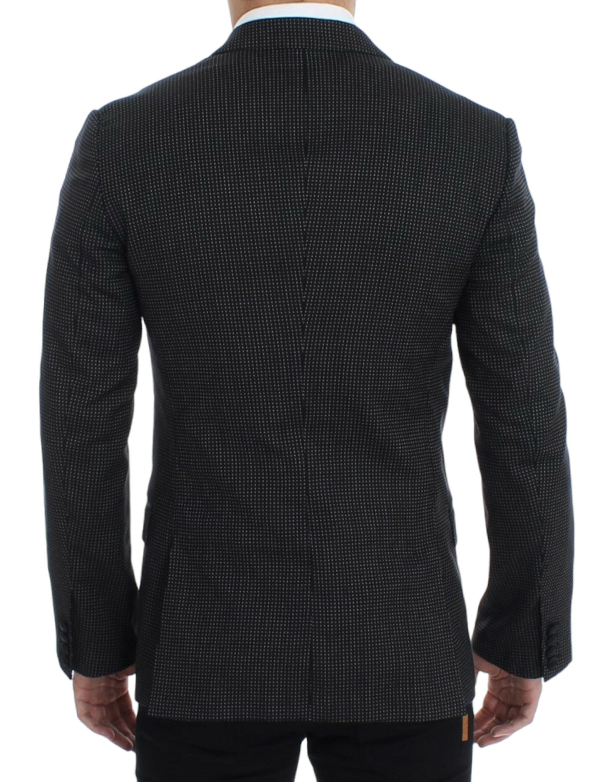 Black wool slim fit Martini blazer by Dolce & Gabbana, showing tailored lapels and sleek design on a mannequin.