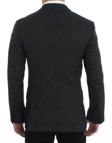 Black wool slim fit Martini blazer by Dolce & Gabbana, showing tailored lapels and sleek design on a mannequin.