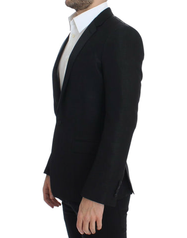 Black wool Martini slim blazer by Dolce & Gabbana, tailored fit with structured lapels and sleek design, shown on a mannequin.