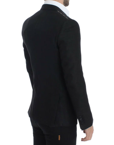 Black wool Martini slim blazer by Dolce & Gabbana, tailored fit with notch lapels and button closure, displayed on a hanger.