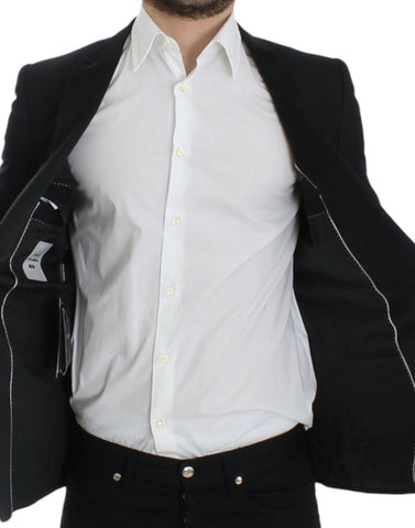Black wool Martini slim blazer by Dolce & Gabbana, tailored fit with notch lapels and single-button closure, stylish and elegant.