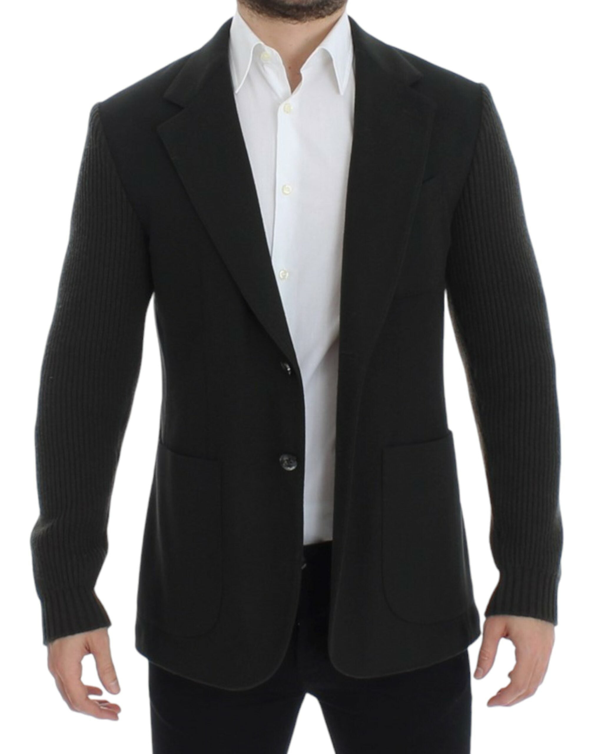 Green Dolce & Gabbana cashmere two-button blazer shown on a hanger with detailed fabric texture and classic tailored design.