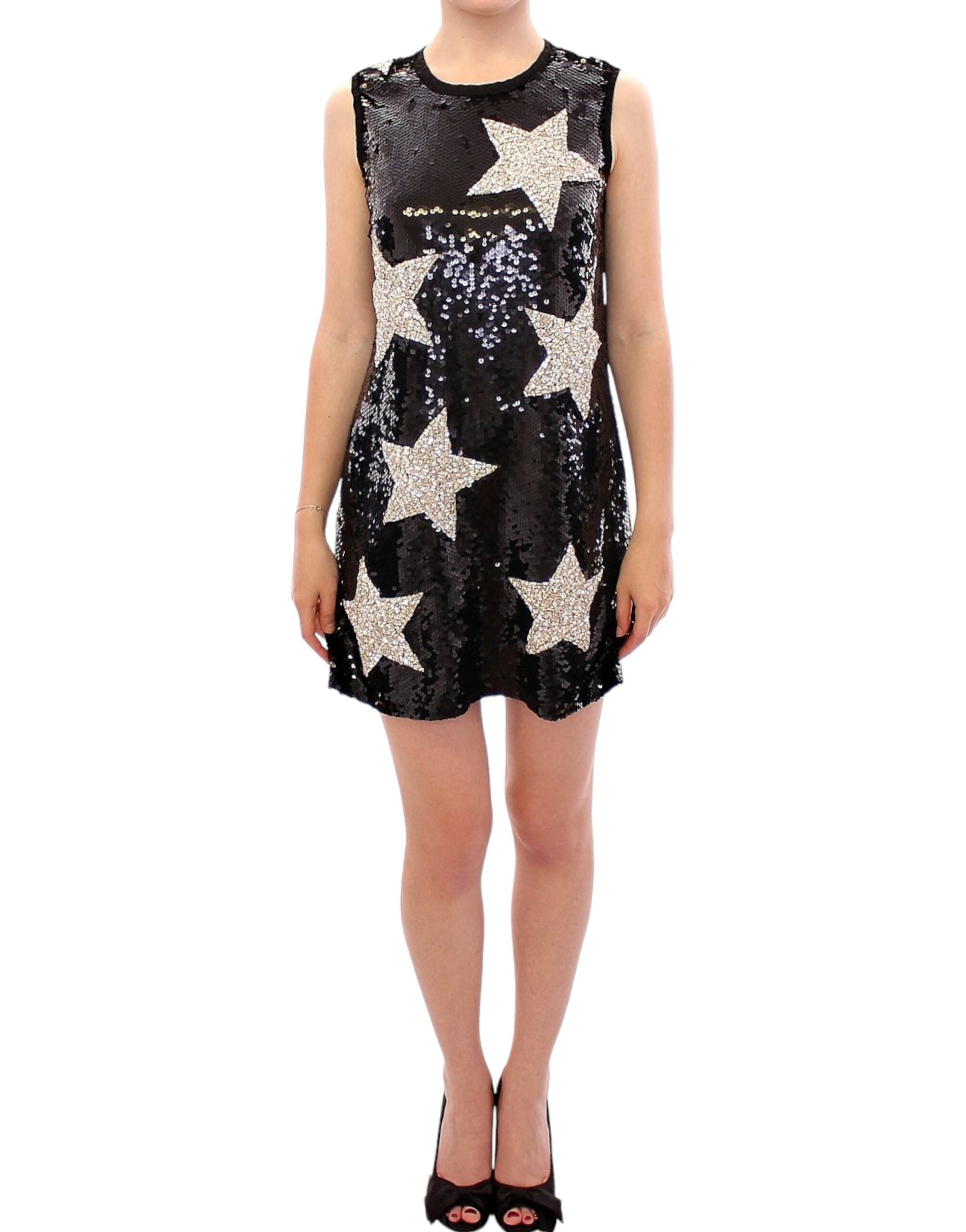 Black Swarovski crystal star sheath dress by Dolce & Gabbana, featuring a fitted silhouette and intricate crystal embellishments.
