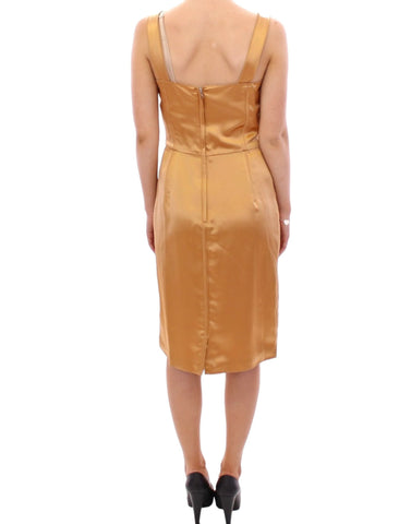 Bronze silk sheath dress by Dolce & Gabbana showcasing a sleek, fitted silhouette and luxurious fabric.