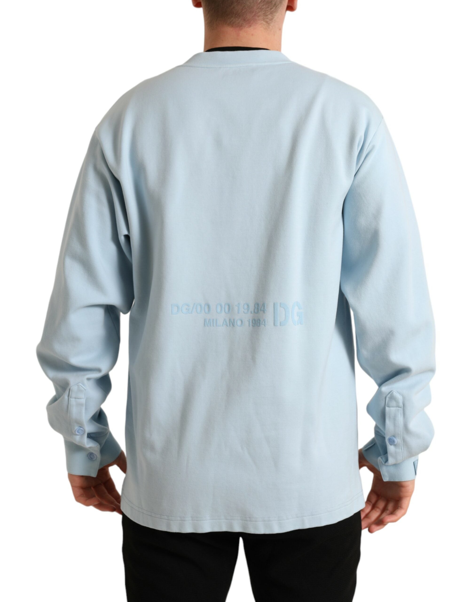 Light blue cotton buttoned pullover sweater by Dolce & Gabbana, featuring a classic knit design and button details.