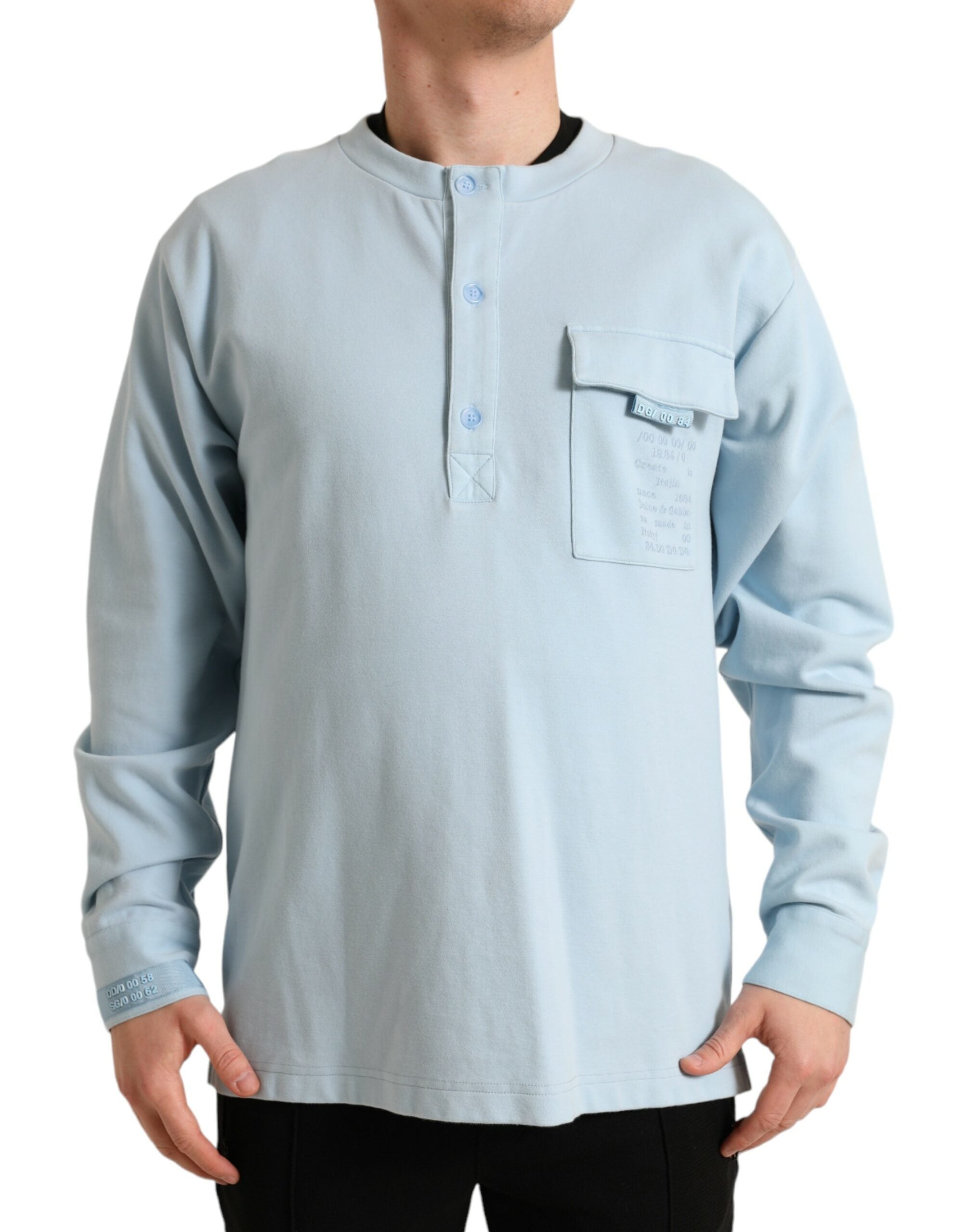 Light blue cotton buttoned pullover sweater by Dolce & Gabbana, featuring a classic crewneck and button details.