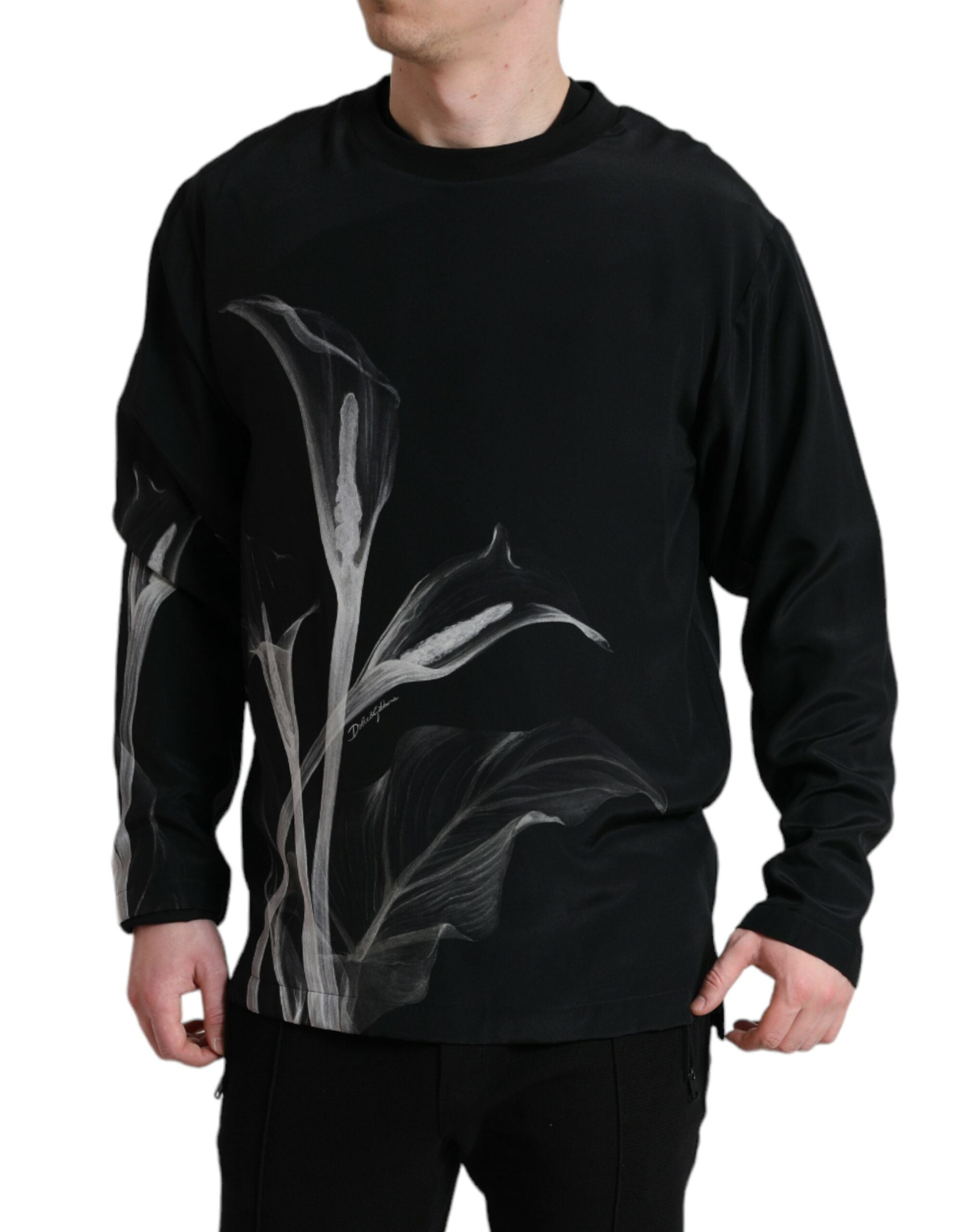 Black floral print crewneck pullover sweater by Dolce & Gabbana, featuring a stylish floral design on soft fabric.