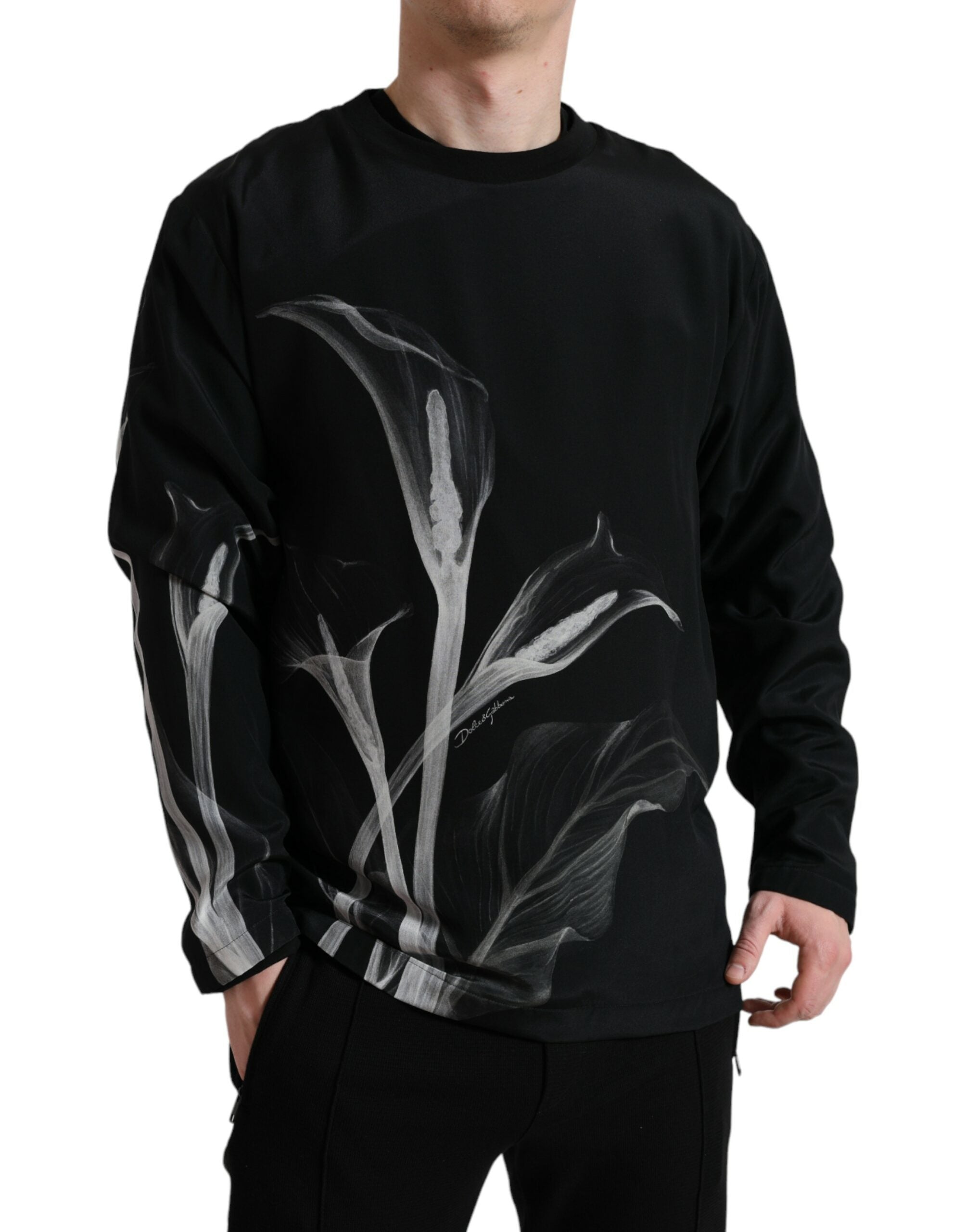 Black floral print crewneck sweater by Dolce & Gabbana, featuring a stylish floral design and cozy knit fabric.