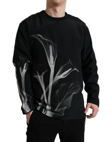 Black floral print crewneck sweater by Dolce & Gabbana, featuring a stylish floral design and cozy knit fabric.