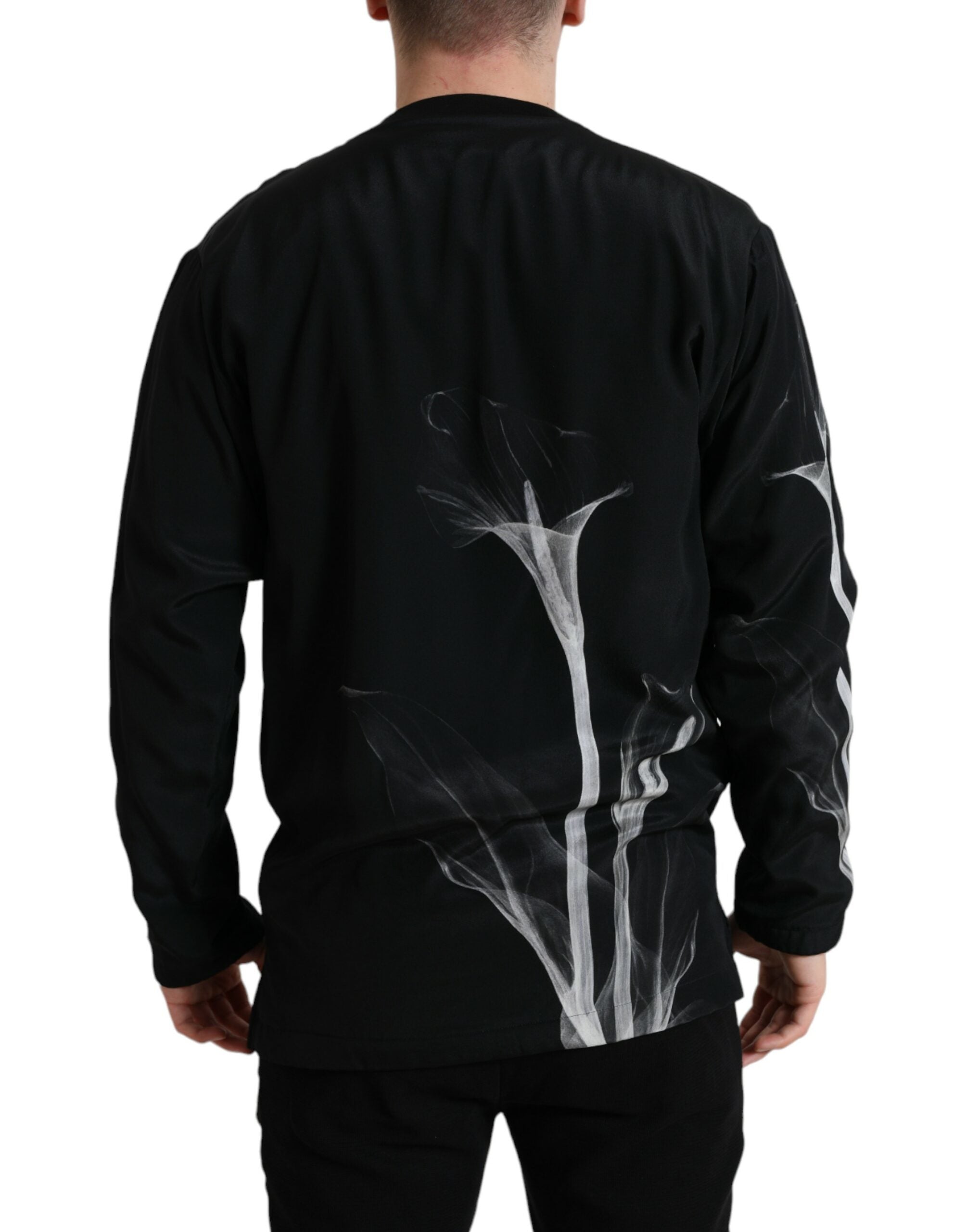 Dolce & Gabbana black floral print crewneck pullover sweater with long sleeves and ribbed cuffs.