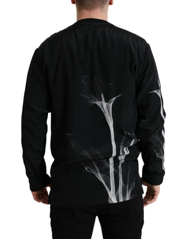 Dolce & Gabbana black floral print crewneck pullover sweater with long sleeves and ribbed cuffs.