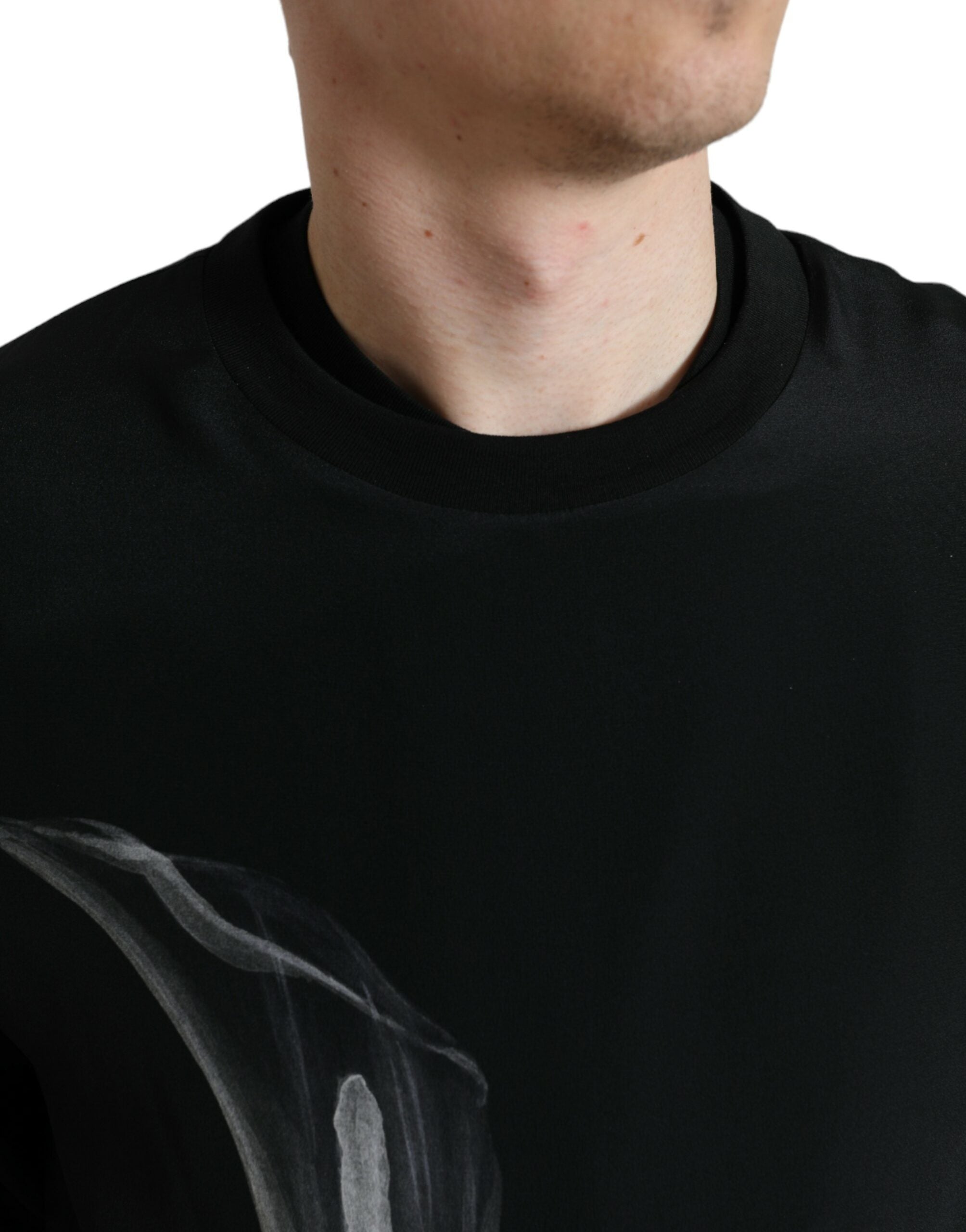 Black floral print crewneck sweater by Dolce & Gabbana, showcasing a stylish pullover with vibrant floral pattern and ribbed cuffs.