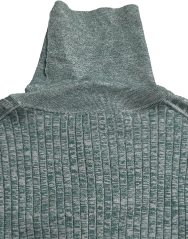 Green polyester turtleneck pullover sweater by Dolce & Gabbana, featuring a close-up of the fabric and classic turtleneck design.