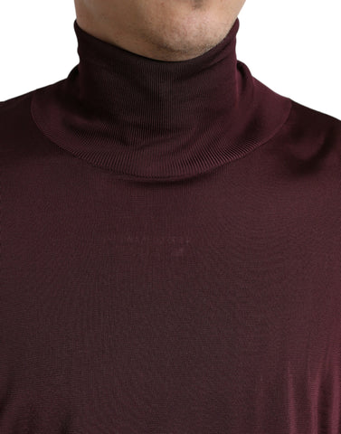 Maroon Dolce & Gabbana viscose turtleneck pullover sweater displayed on a hanger.