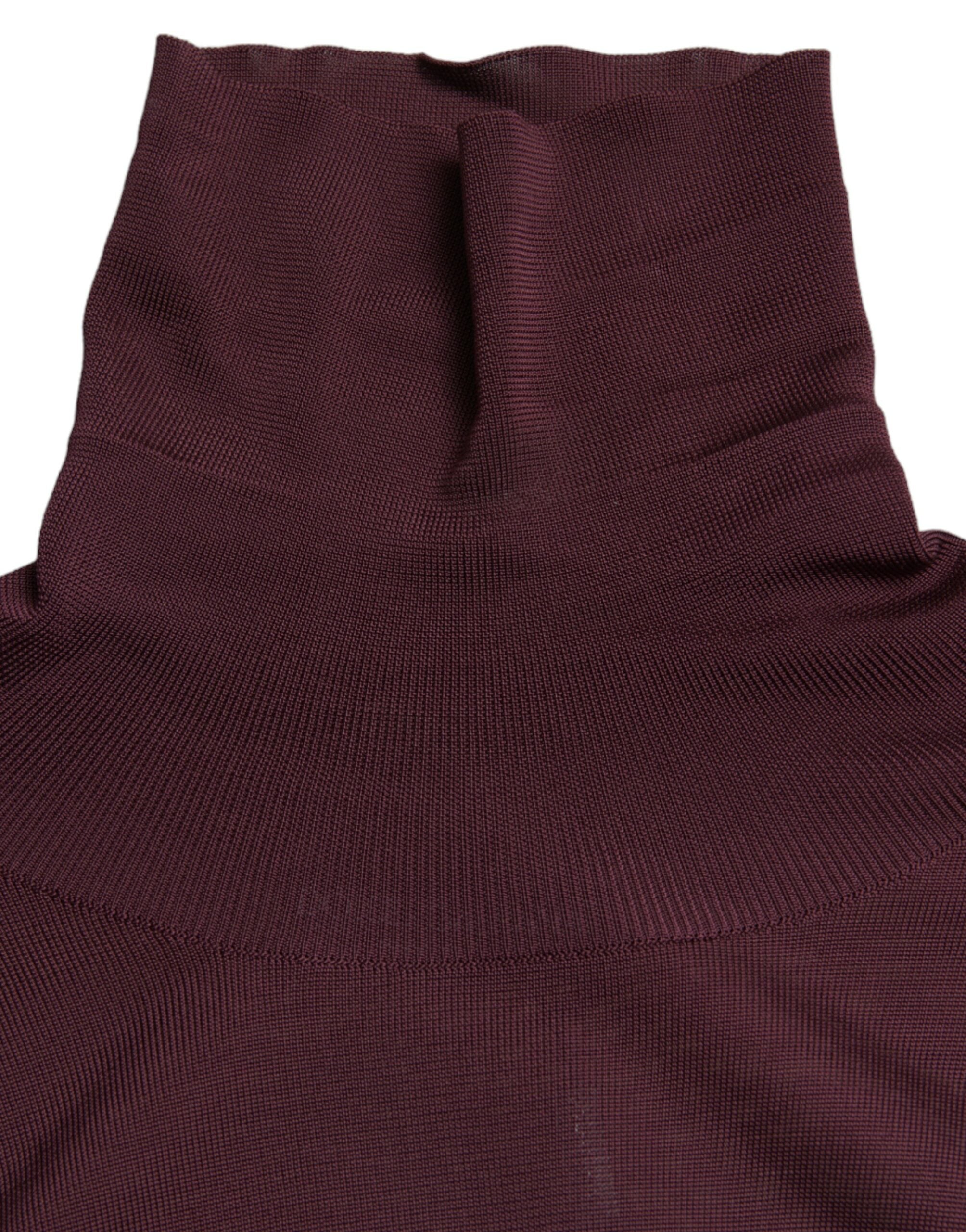 Dolce & Gabbana maroon viscose turtleneck pullover sweater displayed on a model, showcasing a stylish, cozy knit design.