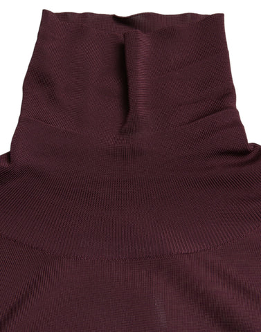 Dolce & Gabbana maroon viscose turtleneck pullover sweater displayed on a model, showcasing a stylish, cozy knit design.