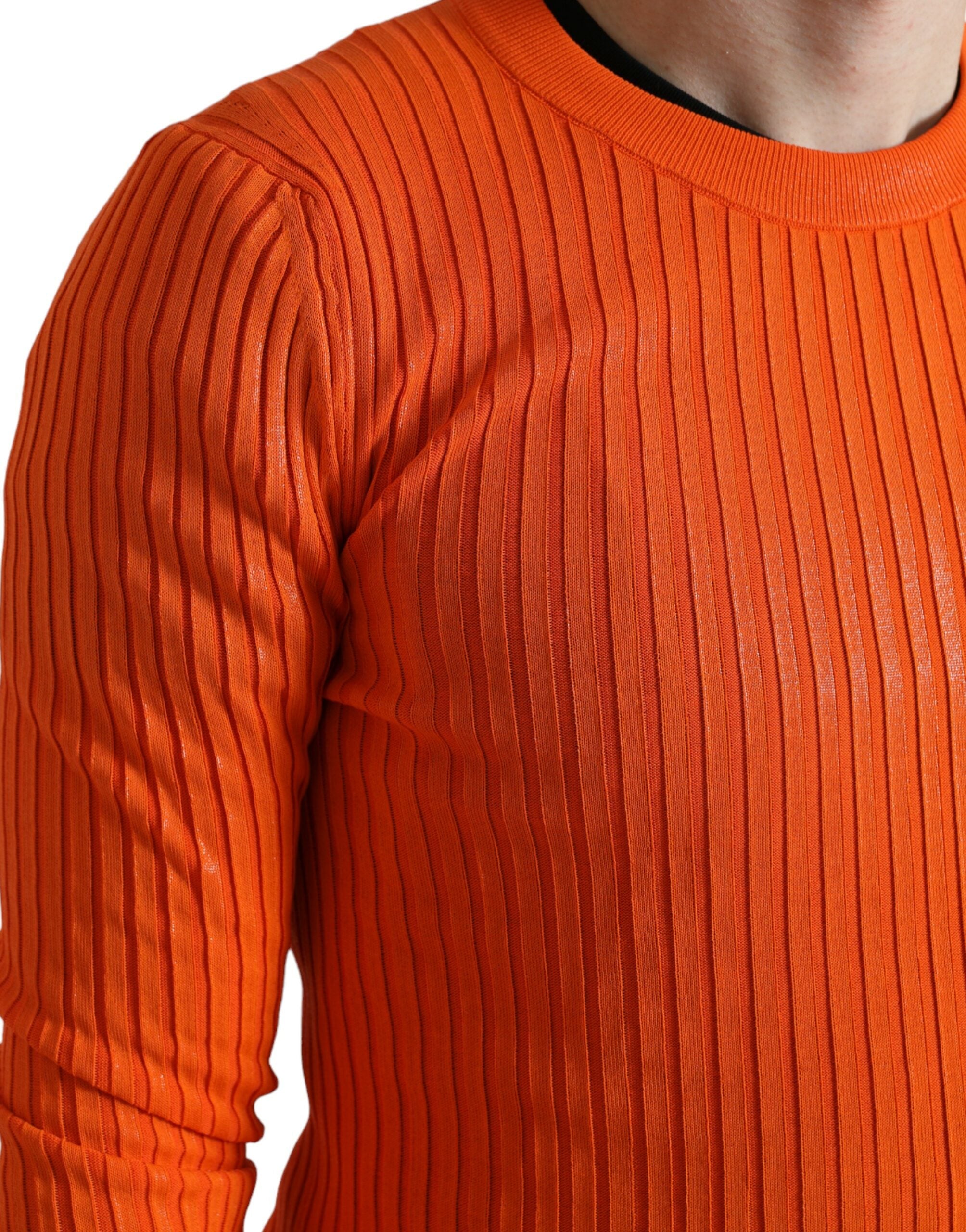 Orange knitted crewneck men's pullover sweater by Dolce & Gabbana, showing a close-up of the textured knit fabric.