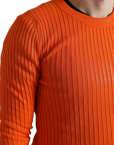 Orange knitted crewneck men's pullover sweater by Dolce & Gabbana, showing a close-up of the textured knit fabric.