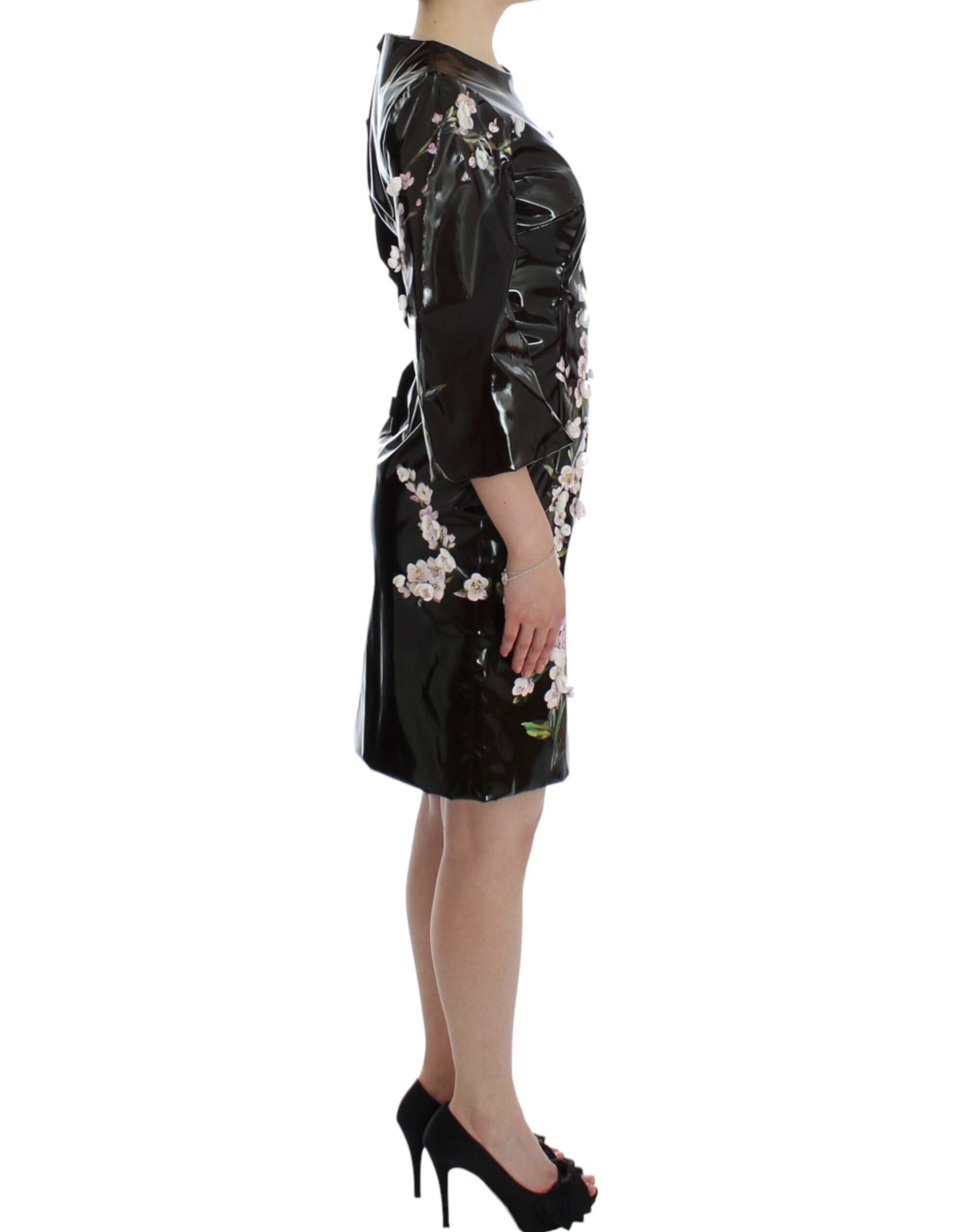 Black floral 3/4 sleeve sheath dress by Dolce & Gabbana, shown with elegant fit and floral pattern on smooth fabric.