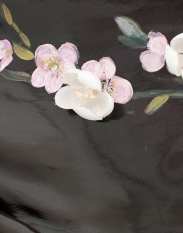 Black floral 3/4 sleeve sheath dress by Dolce & Gabbana, featuring a fitted silhouette and elegant floral pattern.