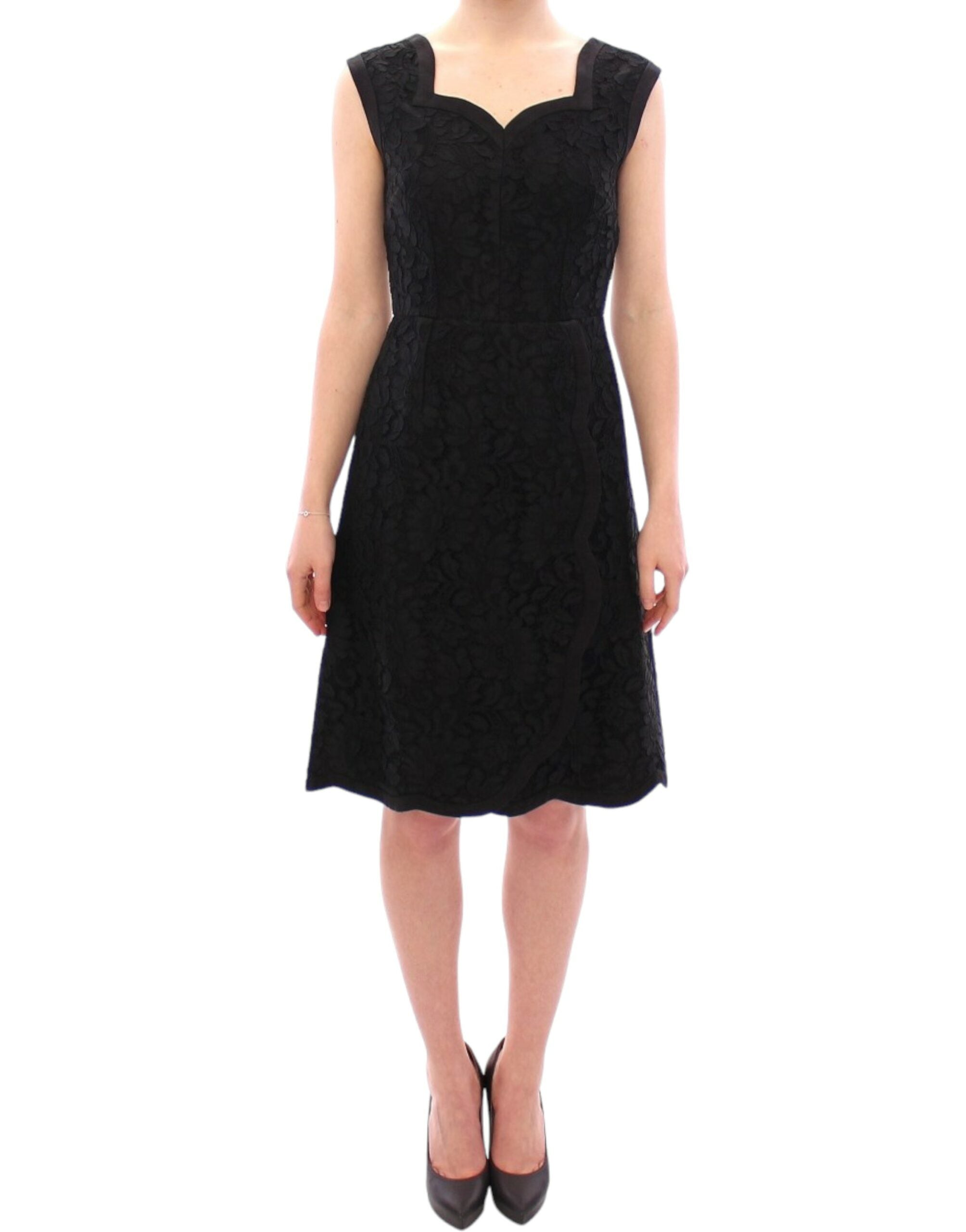 Black floral lace Sicily runway dress by Dolce & Gabbana, featuring intricate lace details and a fitted silhouette.